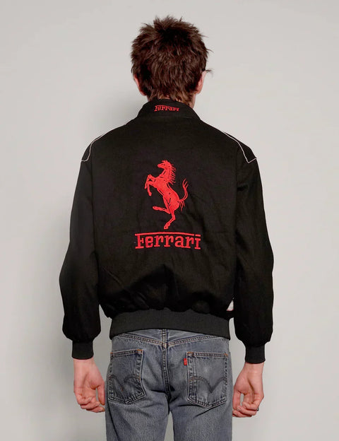 Back design showing the structured drape of the oversized y2k black ferrari jacket