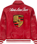 Close-up of racing patches and zip closure on red leather jacket for women