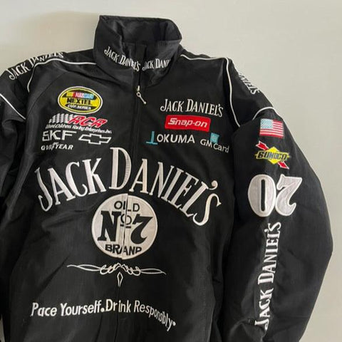 Black jack daniels racing jacket with multiple brand logos on a light gray background