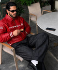 Blckout red leather racing jacket sleeve and stitching detail Vintage-inspired red racing jacket with sporty detailing